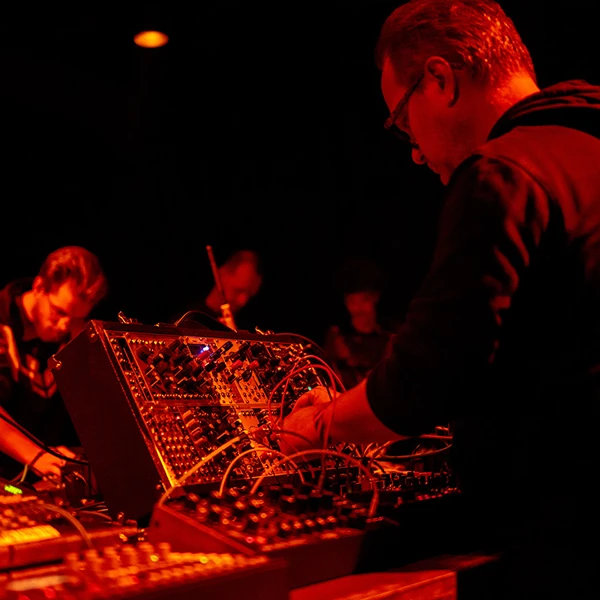 Insect O. performing with other artists on modular synthesizers